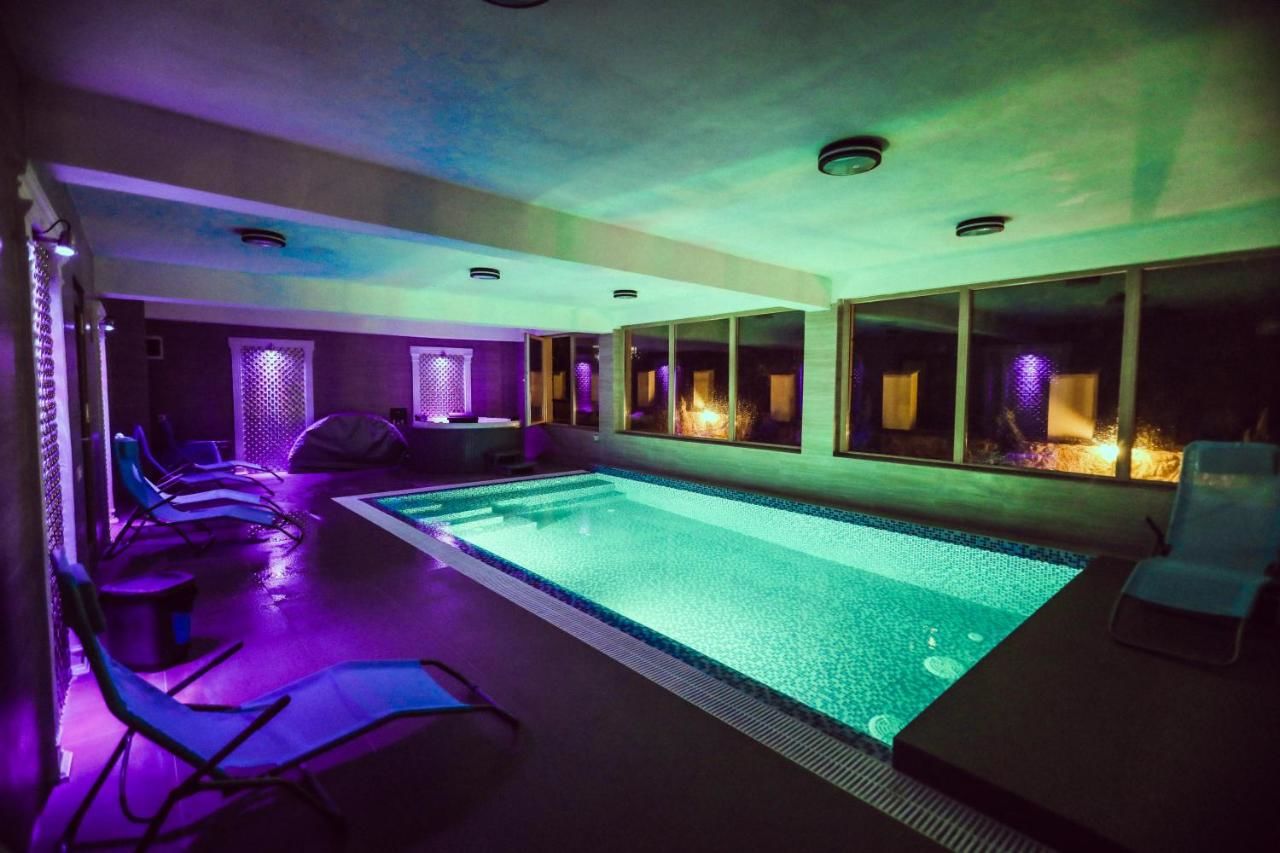 Отель Pensiunea JOJO Imperial Resort&Spa Бэиле-Еркулане-11
